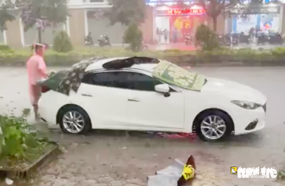 冰雹襲擊義安省，居民用毯子蓋汽車