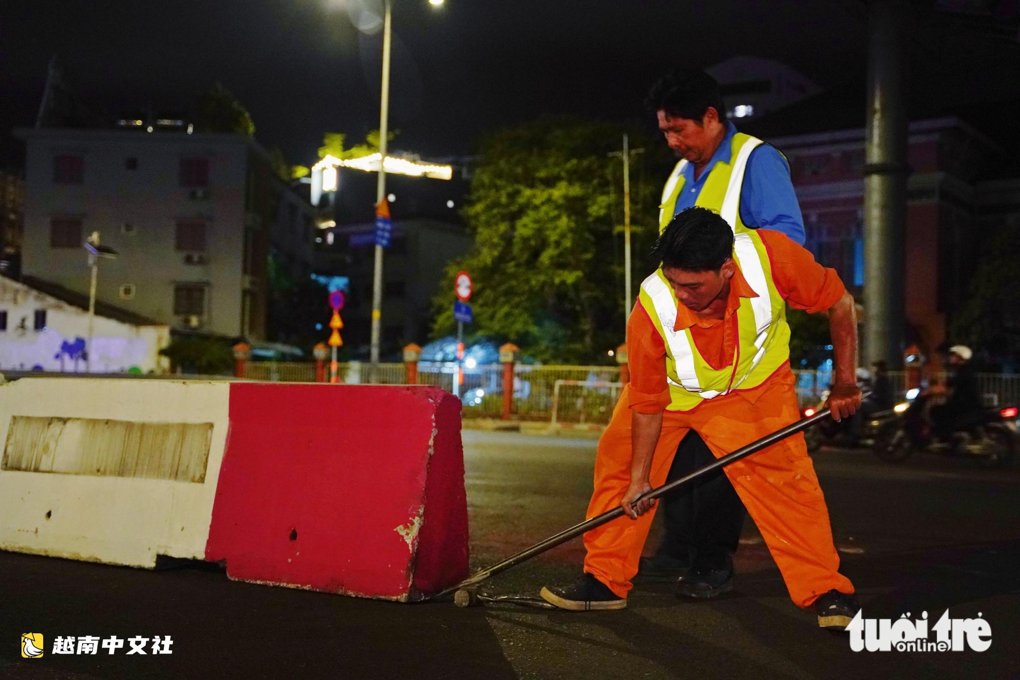 越南奠邊府-阮秉謙環島:連夜路面劃線、安裝護欄