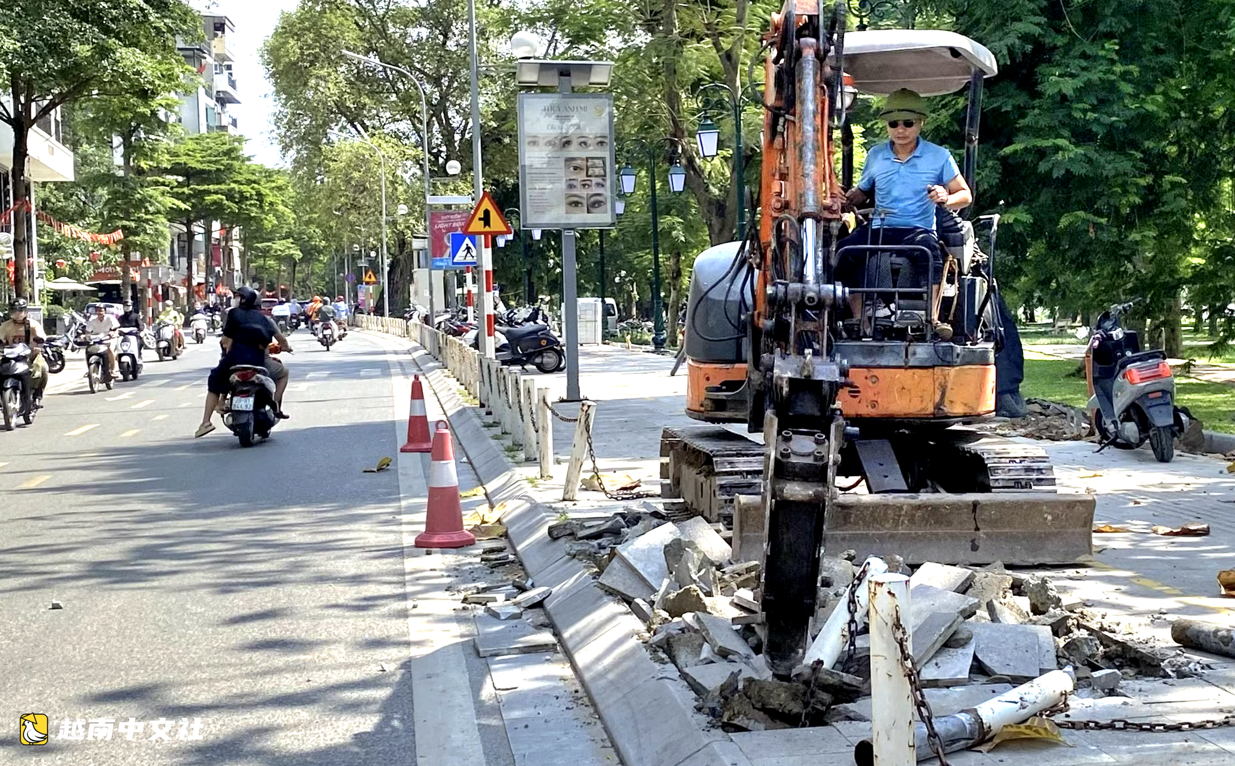 越南二征夫人坊向河內市委報告“百年億越道路鋪設石質人行道被鑿毀”事件