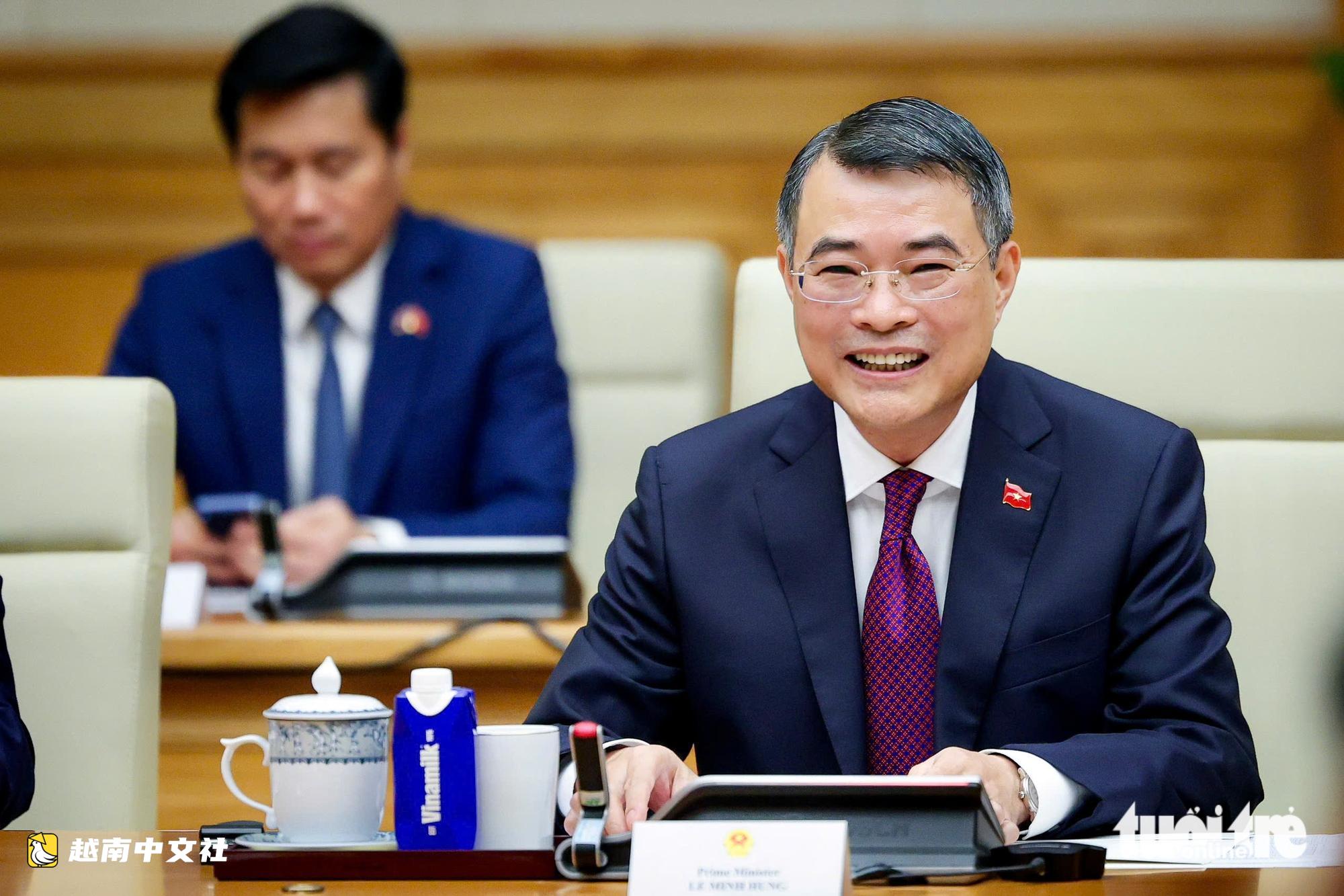 越南總理黎明興主持儀式歡迎老撾總理宋賽·西潘敦