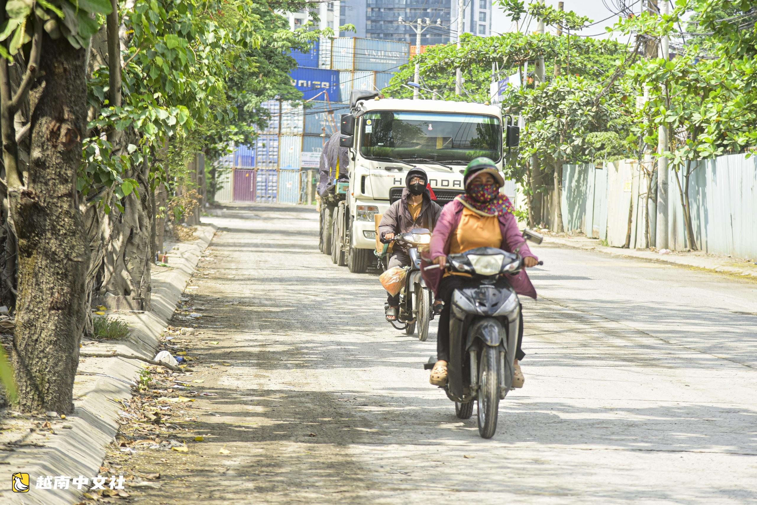 越南胡志明市富順坊同時動工4條道路,居民即將告別在集裝箱車流中穿行的困境