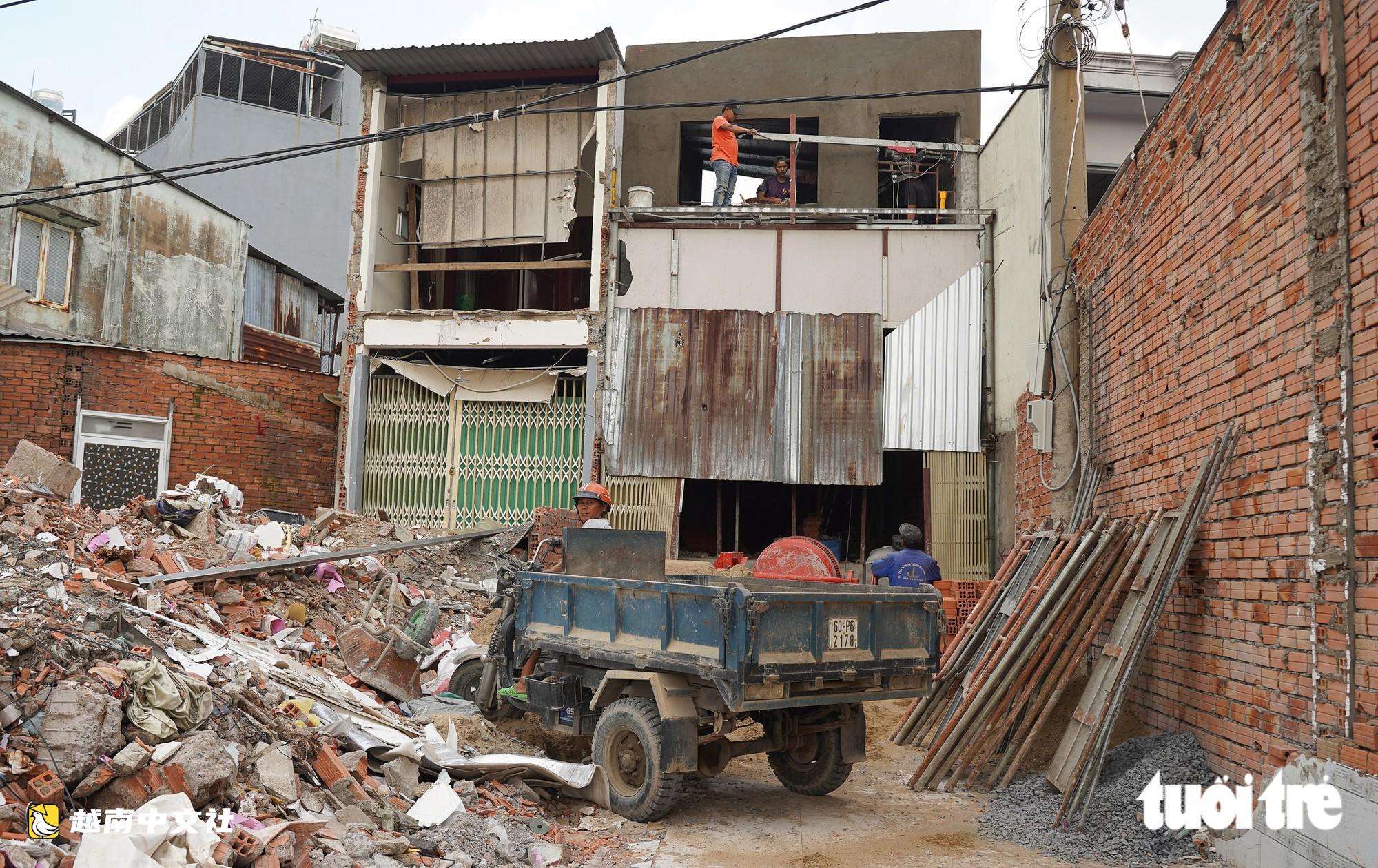 胡志明市居民忙著搬家騰地以擴建13號國道