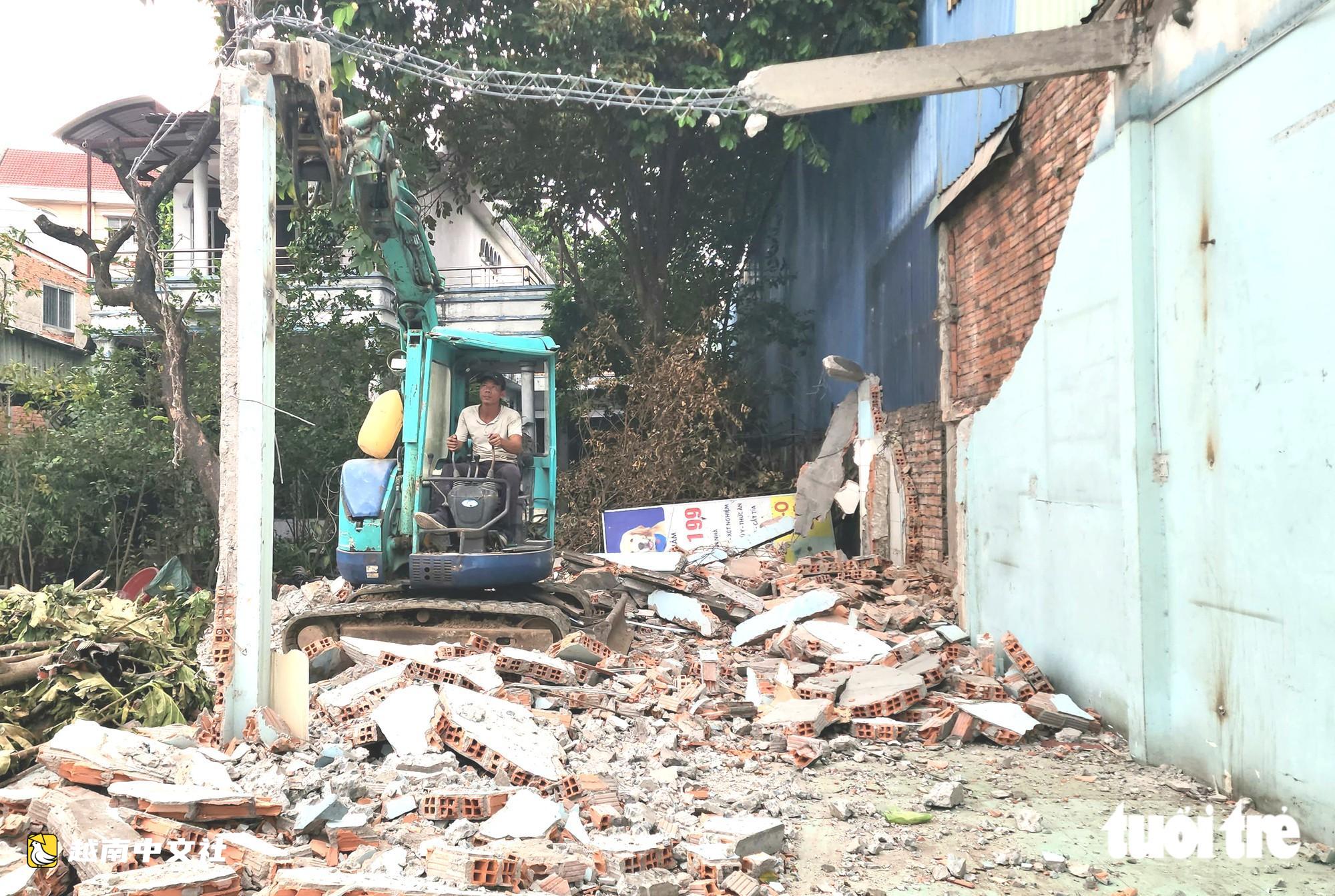 胡志明市1號國道擴建項目交地,拆除和收購“舊房”行業一片繁忙