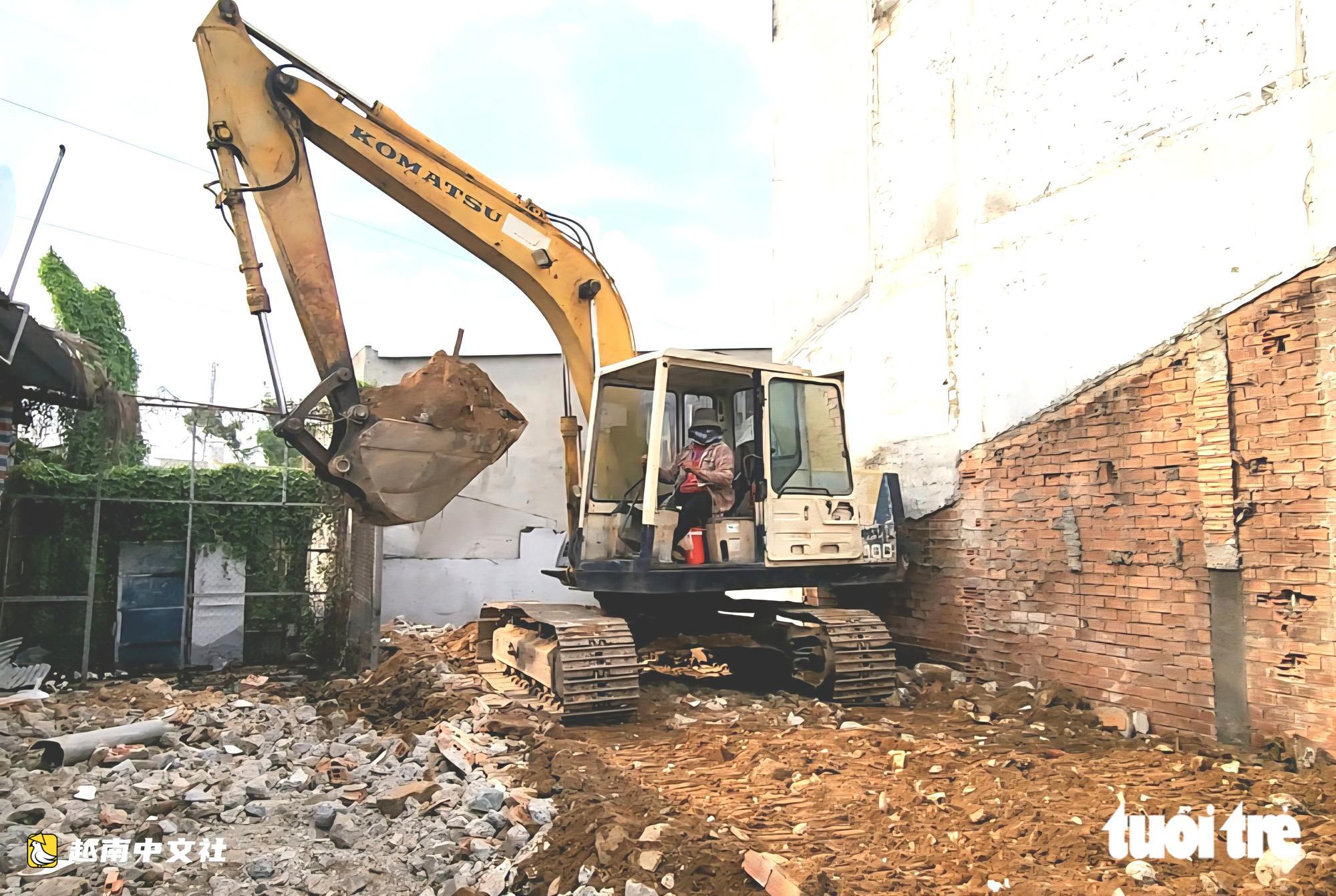 胡志明市1號國道擴建項目交地,拆除和收購“舊房”行業一片繁忙