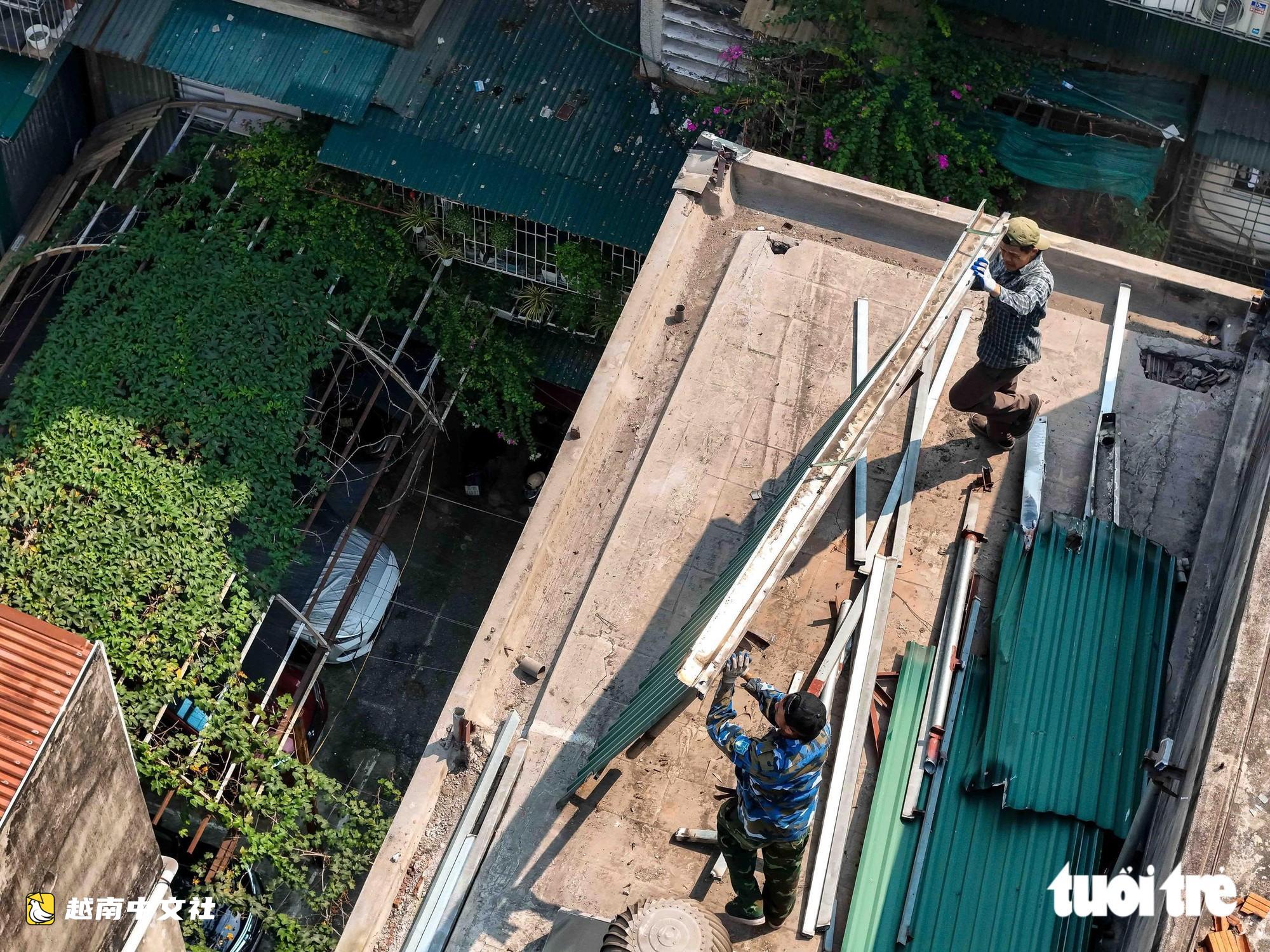 領到一袋袋補償款，河內市民忙著搬家，移交一號國道擴建用地