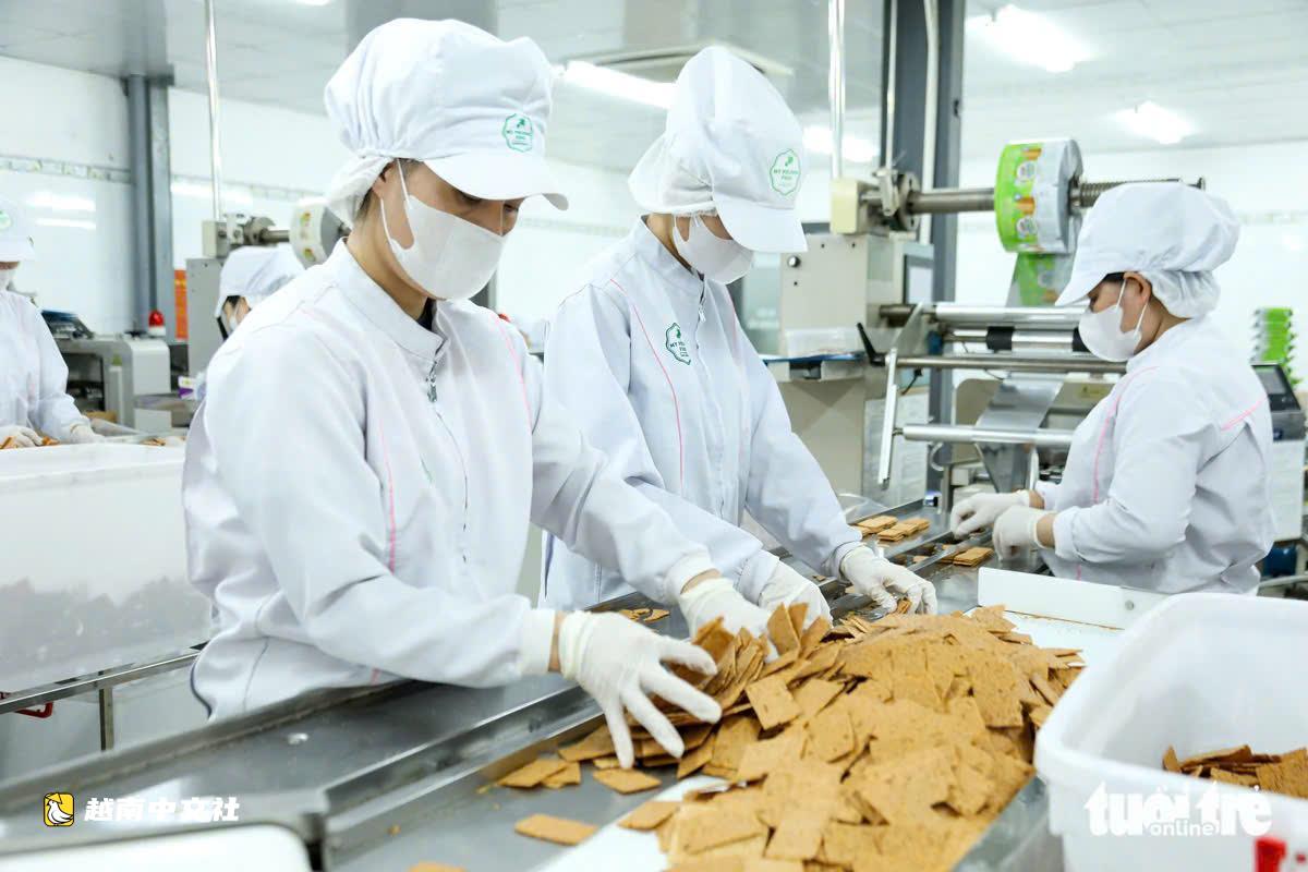 10月13日越南企業家日:精簡手續,為企業提供代金券支持